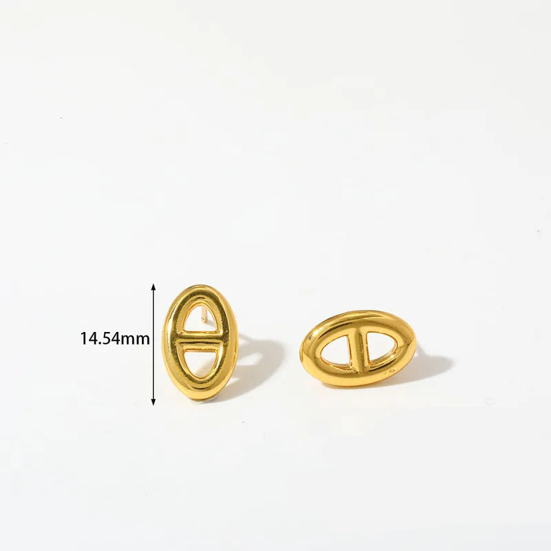 A pair of small gold oval stud earrings with a double-ring cutout design, shown on a white background with text indicating 14.54mm height and 3.